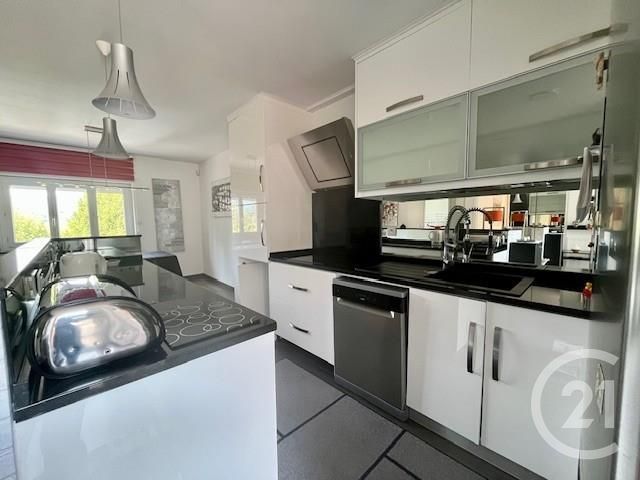 Afficher la photo en grand Appartement Duplex à vendre - 4 pièces - 80.01 m2 - FONTAINES SUR SAONE - 69 - RHONE-ALPES - Century 21 L'Immobilière Jassans